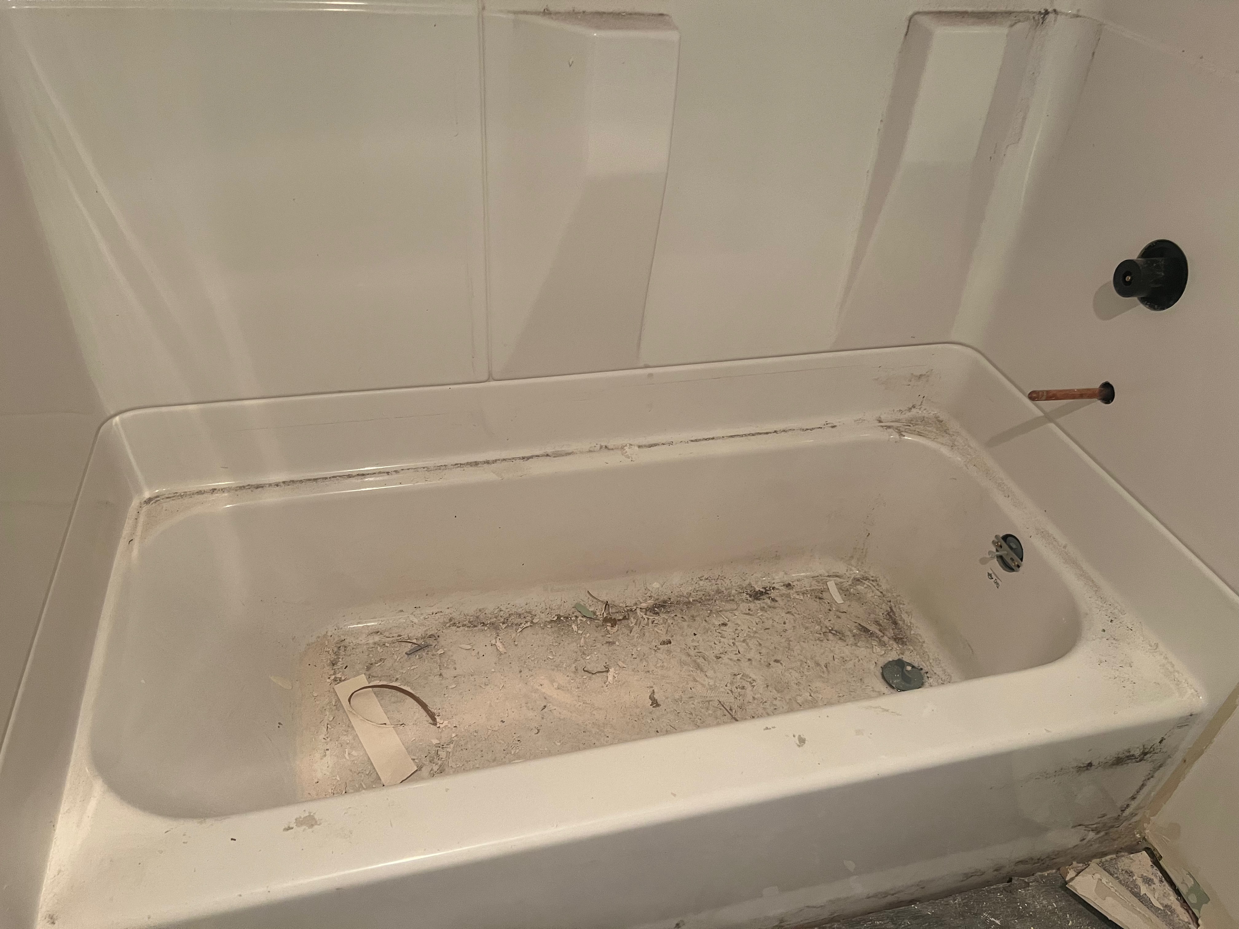 Before construction final cleaning - bathtub